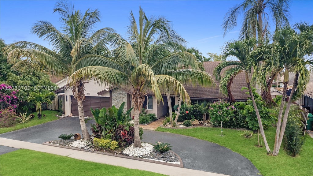 Photo of 7363 NW 49th St, Lauderhill, FL 33319 (MLS # A12030789)