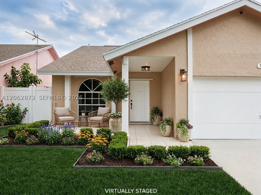 Photo of 7927 NW 50th St, Lauderhill, FL 33351 (MLS # A12062873)