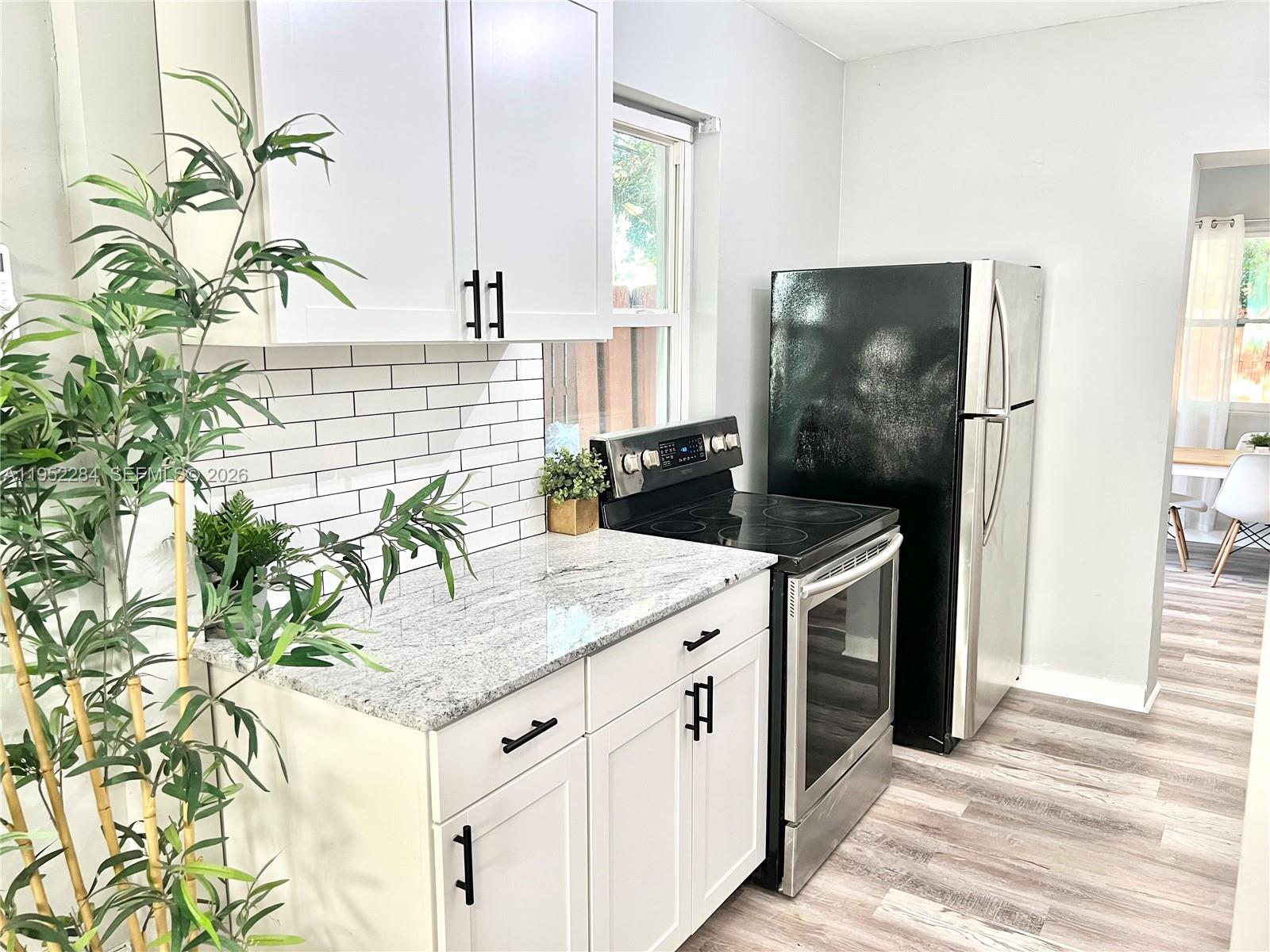 View photos, virtual tours, details... 436 NW 15th Ave