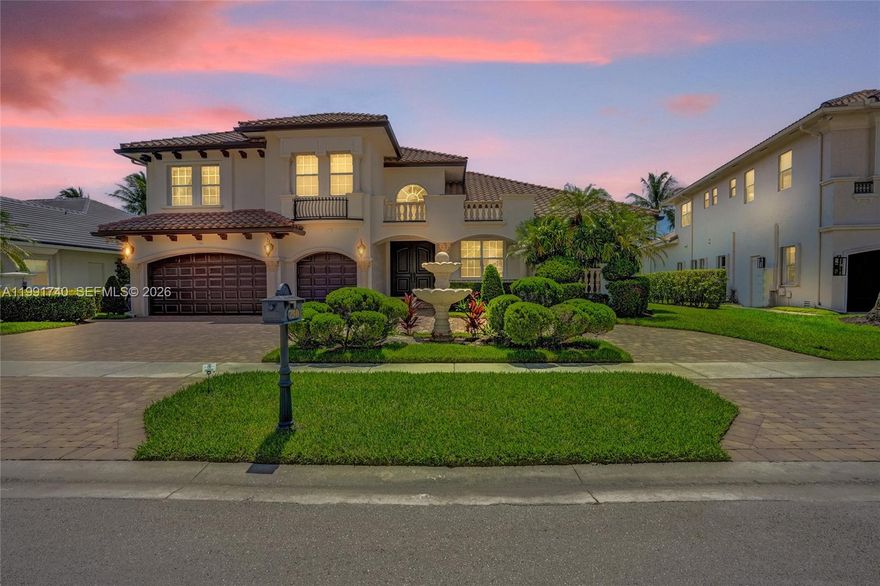 Experience modern luxury in this stunning waterfront home in the exclusive guard-gated community of Hawks Landing. This 2-story residence offers 5 bedrooms, 4.5 bathrooms, and a 3-car garage with over 3,800 sq ft on a 10,510 sq ft lot with breathtaking lake views. Step inside to soaring 20-ft ceilings and dramatic floor-to-ceiling glass walls that flood the home with natural light. Elegant Italian marble floors and staircase have been recently refinished, adding timeless sophistication throughout. The gourmet kitchen features high-end appliances including a 6-burner gas cooktop, double ovens, wine cooler, ice maker, warming drawer, and a spacious walk-in pantry, perfect for entertaining. The first floor includes an office/5th bedroom, offering flexibility for work or guests, and a spacious primary suite with direct pool access, tray ceilings, dual walk-in closets, and a spa-like bath. Upstairs offers 3 bedrooms, a loft, and 2 full baths. Enjoy outdoor living with a summer kitchen, infinity pool, and heated spa overlooking the lake, ideal for relaxing or hosting guests. Upgrades include impact glass, new A/C, epoxy garage floor, and 2025 updates: interior/exterior paint, washer/dryer, and diamond brite pool. Resort-style amenities include an Olympic-size pool, pickleball and tennis complex, fitness center and spa, basketball courts, and a recently renovated clubhouse, offering a true country club lifestyle with the perfect blend of luxury, elegance, and active living.