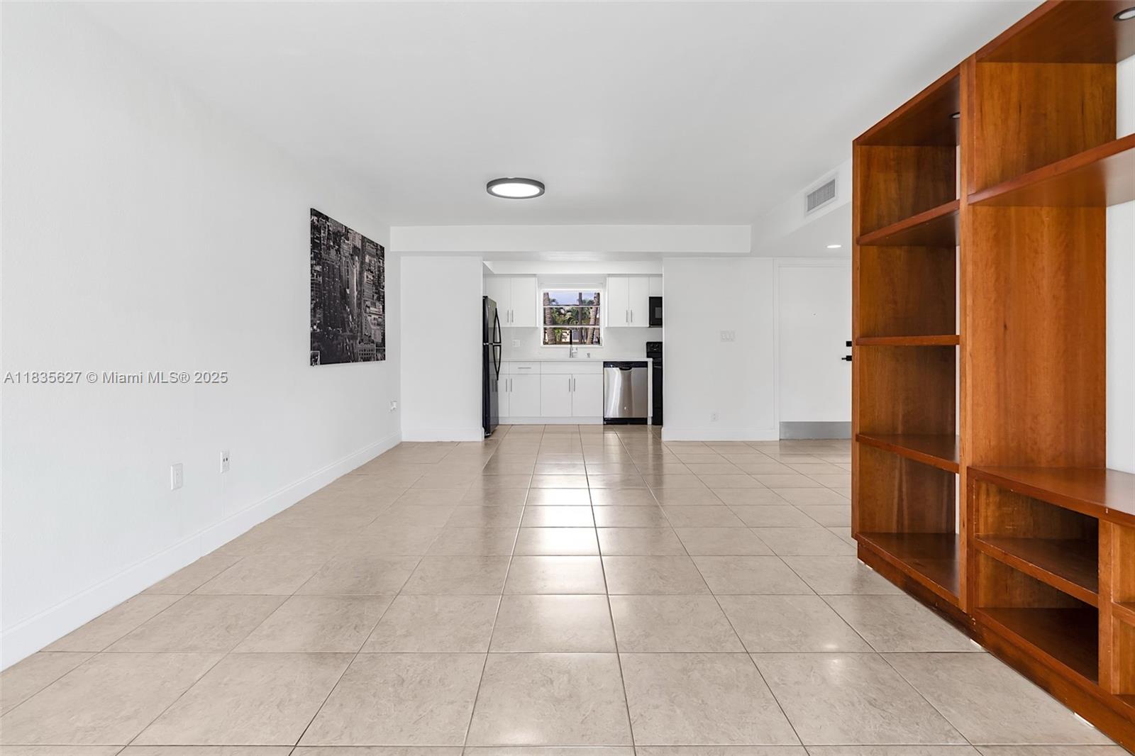 Spacious and completely remodeled one-bedroom, one-bath unit with washer and dryer located just blocks from Dadeland Mall, Metrorail, major highways, shops, and restaurants. This beautiful unit is ideal for both end users and investors—previously rented for $2,100/month. Includes one assigned parking space, plus guest and street parking. Enjoy community amenities such as a pool, pickleball, tennis, racquetball courts, and a scenic walk/jog path along the canal.