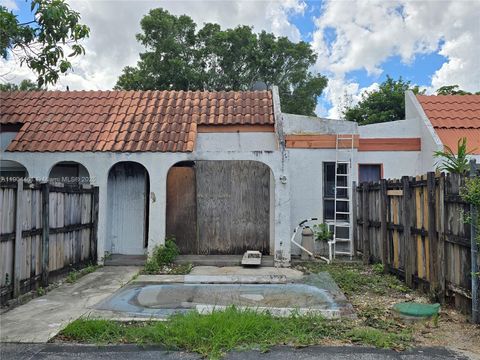 Photo of 2211 NW 55th Ter, Lauderhill, FL 33313 (MLS # A11904461) Photo of 2211 NW 55th Ter, Lauderhill, FL 33313 (MLS # A11904461)