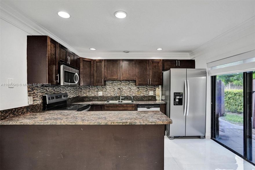 Just in time for the New Year! Discover the perfect blend of comfort and style in this fee simple, 2-story townhome! Featuring 2 spacious bedrooms upstairs, both with generous proportions, and 2.5 bathrooms, this home offers ample room to relax. The open kitchen flows seamlessly into a bright, welcoming great room – ideal for entertaining. Enjoy modern upgrades throughout, including brand-new porcelain flooring and sleek stainless-steel appliances. Added convenience with in-unit washer and dryer. A wonderful layout for both living and entertaining in a prime location!

This home qualifies for up to 80k in closing cost and down payment from the city of North Lauderdale.