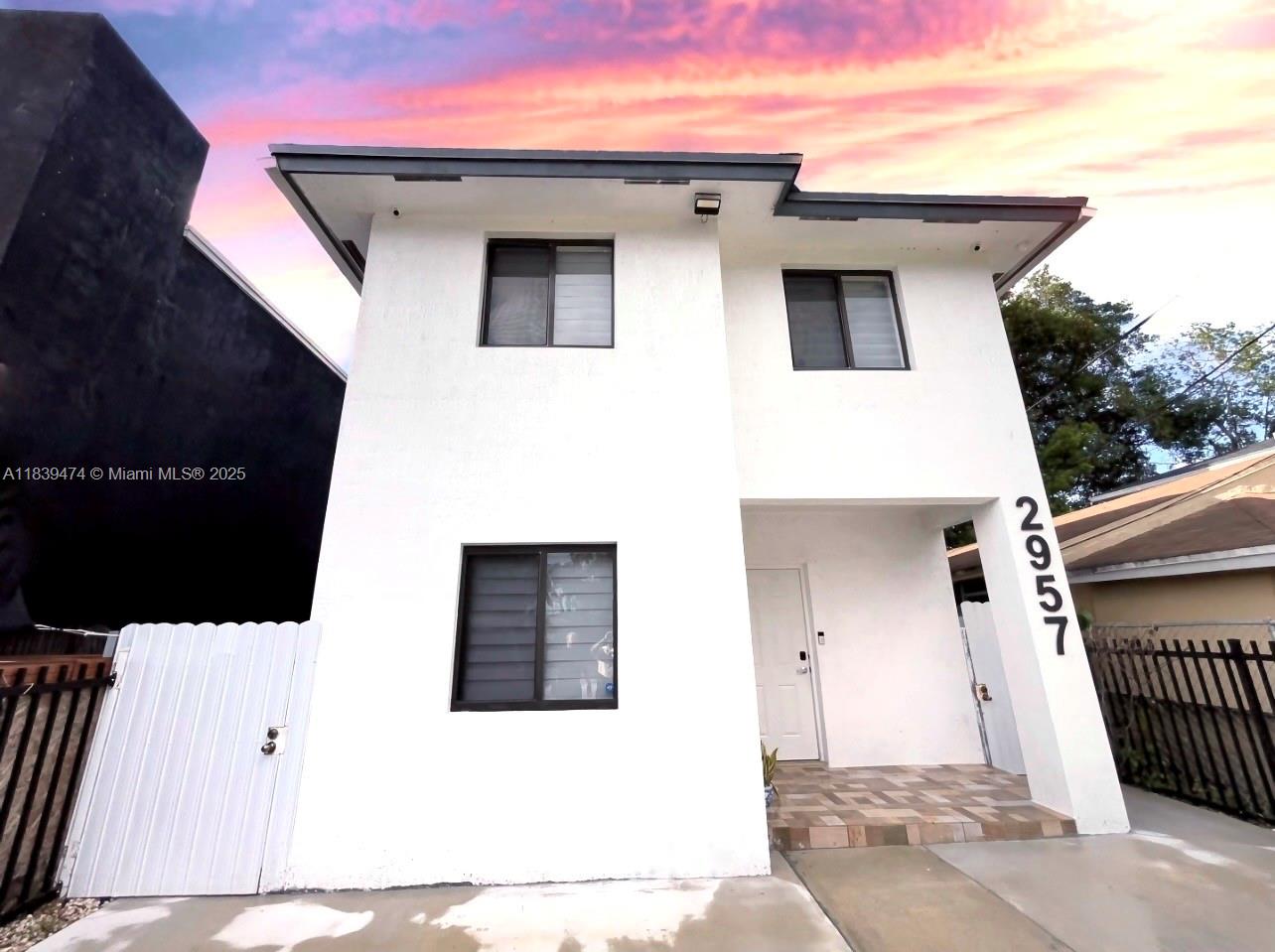 DREAM HOUSE ALERT!! NEW CONSTRUCTION - This gorgeous property is move-in ready and features: 4 Bed / 3 Bath, 1 of the bedroom on first floor has SEPARATE ENTRY with great potential to convert into a studio for an extra source of income. an elegant kitchen with delightful quartz countertops and backsplash, beautiful dark wood cabinets, stainless steel appliances, WASHER/DRYER unit, modern porcelain floor tiles throughout, IMPACT RESISTANT WINDOWS, walk-in closet in master bedroom, central A/C, NEW WATER HEATHER ,elegant shades, fully FENCED AND SPACIOUS YARD PARTIALLY COVER and AUTOMATIC GATE installed in the front area of the property for privacy and safety purposes. Call now for a tour of this gorgeous home, and do not miss out on this amazing opportunity!