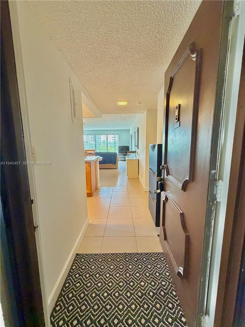 Photo of 2324 S Cypress Bend Dr #316, Pompano Beach, FL 33069 (MLS # A11945457)