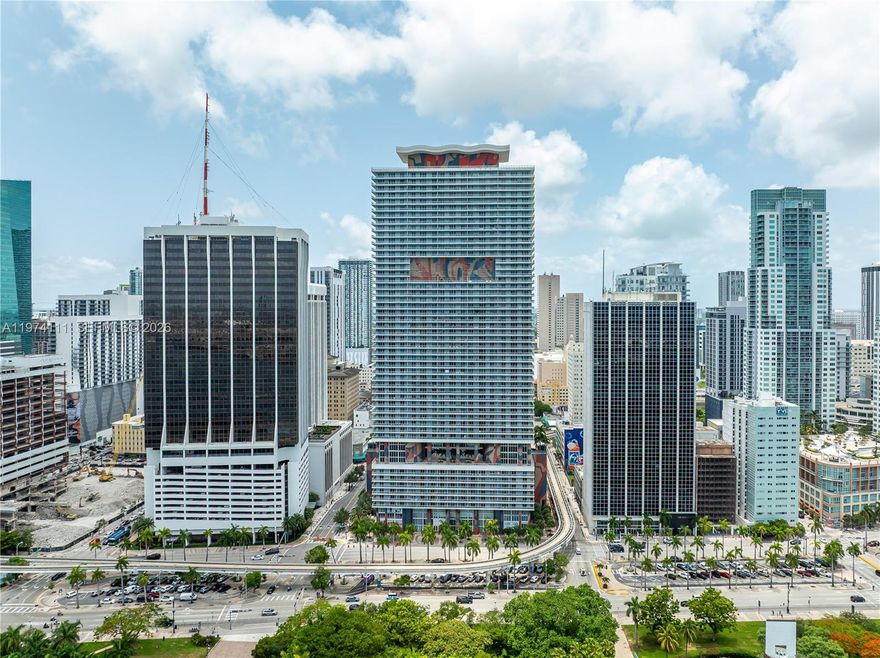 Experience elevated Downtown living in this renovated 2-bedroom + den residence at 50 Biscayne. Enjoy unobstructed views of Biscayne Bay and Bayfront Park from a spacious private balcony. This bright, open-concept unit features floor-to-ceiling windows, modern finishes, and a versatile den ideal as a third bedroom, office, or media room. Residents enjoy resort-style amenities including a full-service spa, fitness center, Pilates studio, infinity pool, and cabanas. Prime location just steps from Kaseya Center, Bayside Marketplace, Whole Foods Market, dining, and entertainment.