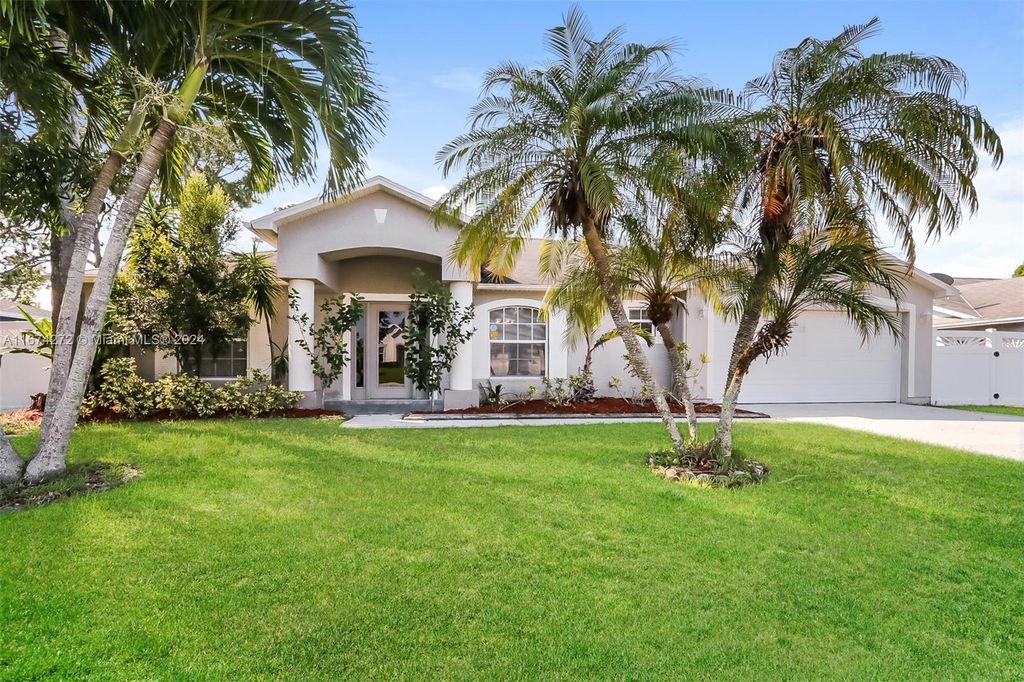 Photo of 2452 SE Sapelo Ave, Port Saint Lucie, FL 34952 (MLS # A11674272)