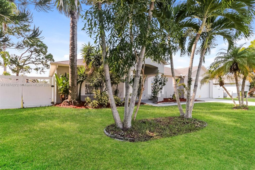 Photo of 2452 SE Sapelo Ave, Port Saint Lucie, FL 34952 (MLS # A11674272)