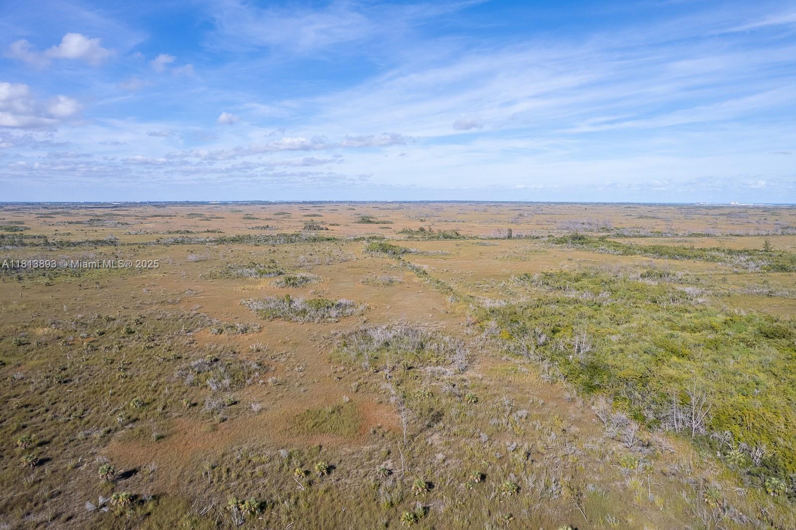 15 acres of mitigation or long term investment land. The area is east of 344 st and west of Turkey Point Power Plant. Great long term investment . Currently property has no zone and being sold as mitigation land or as long term investment land. Currently housing and agriculture is not allowed on property.