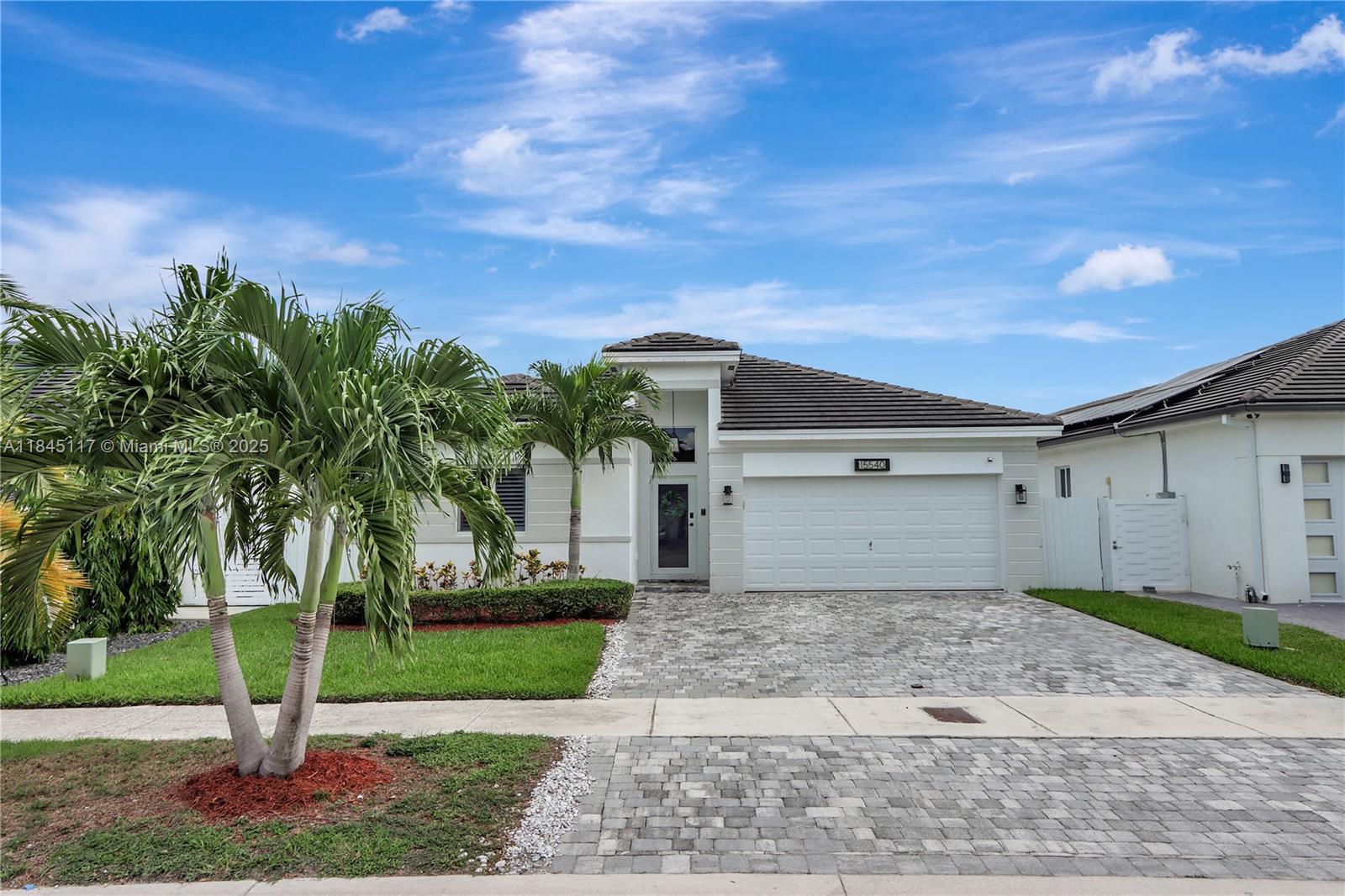 Beautiful 4-bedroom, 3-bathroom home built in 2019 by original owners. Featuring an open-concept layout with 1,970 sq ft of living space, this home offers a spacious kitchen, tile floors throughout, and hurricane impact windows. Two bedrooms share a convenient Jack & Jill bath. Generously sized bedrooms with ample closet space.
Step outside to your private backyard oasis with a sparkling pool, paver patio, artificial turf, and two pergolas—ideal for entertaining. Situated on a 7,251 sq ft lot with a 2-car garage. Centrally located near shopping, dining, schools, and major routes. Modern, move-in ready, and built for comfort and style!
