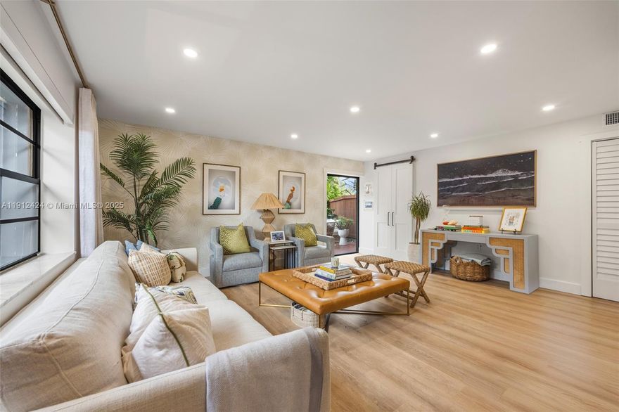 Beautifully remodeled and thoughtfully curated, this 3BD/2.5BA townhouse in gated Snapper Village offers warm, modern living with seamless indoor–outdoor flow. The home features LED recessed lighting throughout, updated kitchen with quartz countertops, custom cabinetry, built-in pantry, and a full-length bench that anchors the dining area. The bright living room opens to a lush, fenced backyard designed for relaxing and entertaining. Upstairs, all bedrooms include built-out closets and refined finishes. A front courtyard, dedicated storage room, and landscaped setting further enhance this home. The community offers resort-style amenities including a pool, tennis courts, playground, and 24-hour security, with an HOA that includes exterior maintenance, cable, internet, water, and more.