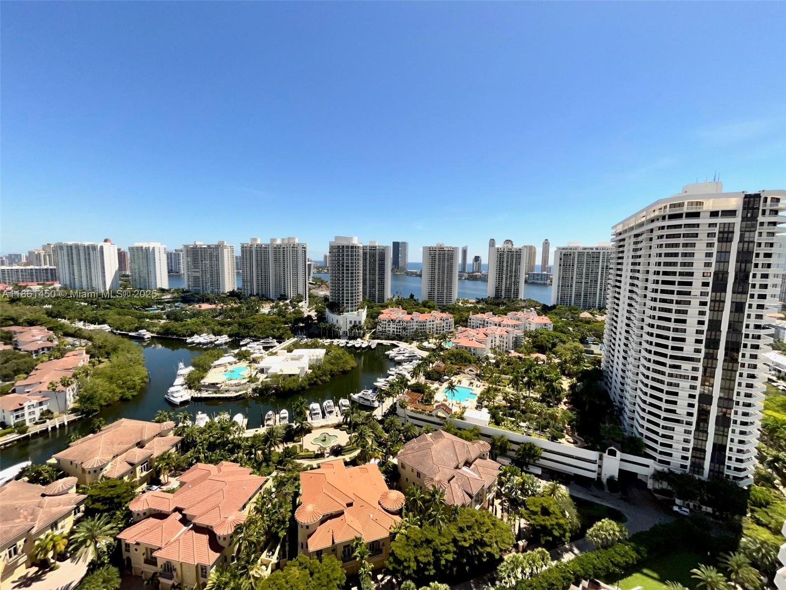 SPECTACULAR VIEWS OVERLOOKING WILLIAMS ISLAND TO THE INTRACOASTAL AND OCEAN FROM ONE SIDE AND SOUTH OVER MAULE LAKE TO DOWNTOWN MIAMI FROM THE OTHER SIDE OF THIS FLOW THRU HIGH FLOOR UNIT. SPLIT BEDROOM PLAN, MARBLE FLOORS, LOTS OF CLOSET SPACE AND EXPANSIVE TERRACES! LIVE IN PRESTIGIOUS WILLIAMS ISLAND WITH FULL AMENITIES: 15 TENNIS COURTS, 4 PICKLE BALL COURTS, 3 RESTAURANTS, STATE OF THE ART SPA, MARINA, WALK/JOG PATH, KIDS PLAYGROUND, COURTESY BUS, WALK TO HOUSES OF WORSHIP AND SO MUCH MORE....