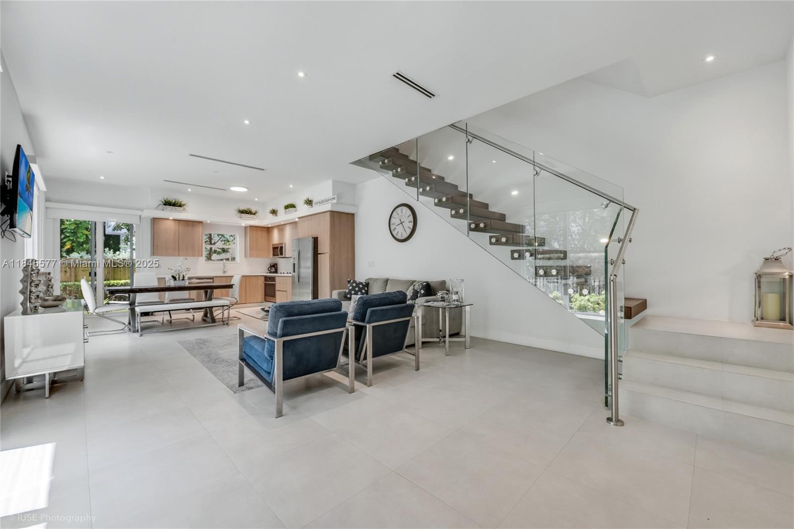 Available Unfurnished or Fully Furnished! Stunning & modern 3BR/2.5BA townhome in the heart of Miami! This light-filled home features an open layout, designer kitchen w/ quartz counters & stainless steel appliances, sleek glass staircase, & high-end finishes throughout. Spacious primary suite w/ walk-in closet & spa-style bath. Enjoy a private fenced yard, 1-car garage, impact windows, & in-unit washer/dryer. Unbeatable location near Coral Gables & Coconut Grove—live where luxury meets convenience! Also available for short term.