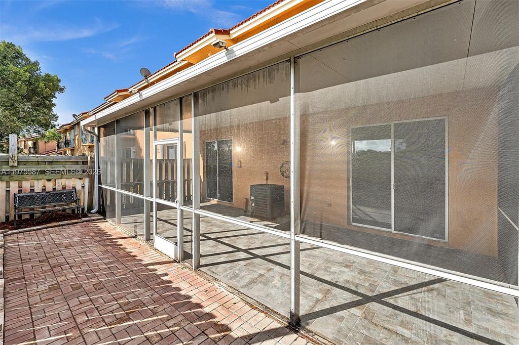 Photo of 2297 NW 160th Ter #2297, Pembroke Pines, FL 33028 (MLS # A11975587)