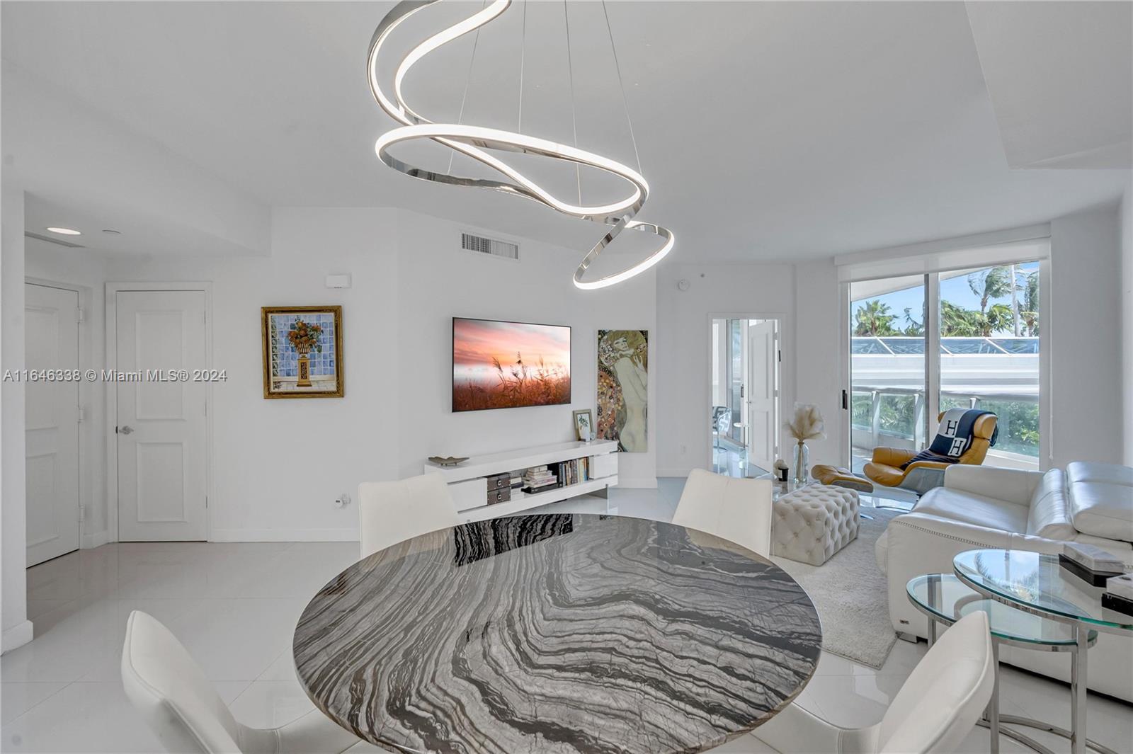 MOTIVATED SELLER! Perfect for investors or as a full-time home! Welcome to this impeccably renovated garden condo, where luxury meets comfort. This stunning pied-Ã -terre offers 1 bed, 1 bath, and an expansive balcony perfect for relaxation. Whether as a full-time residence, vacation retreat, or a second home for guests, adult children, or staff, this condo fits your needs. The fully renovated space features large-format porcelain floors, an open kitchen flowing into a spacious living area, a luxurious master bath, and a walk-in closet. Enjoy 24-hour security, valet service, and an assigned parking space. The 25,000 SF residents club offers a gym, spa, four tennis courts, and three pools, redefining luxury living in Aventura.