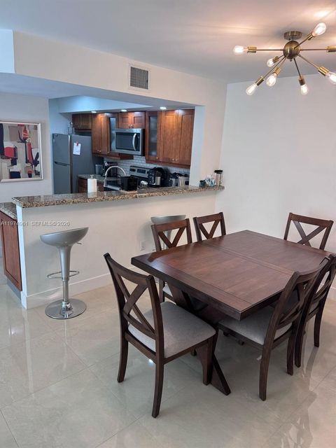 Photo of 18860 NW 57th Ave #208, Hialeah, FL 33015 (MLS # A11974961)