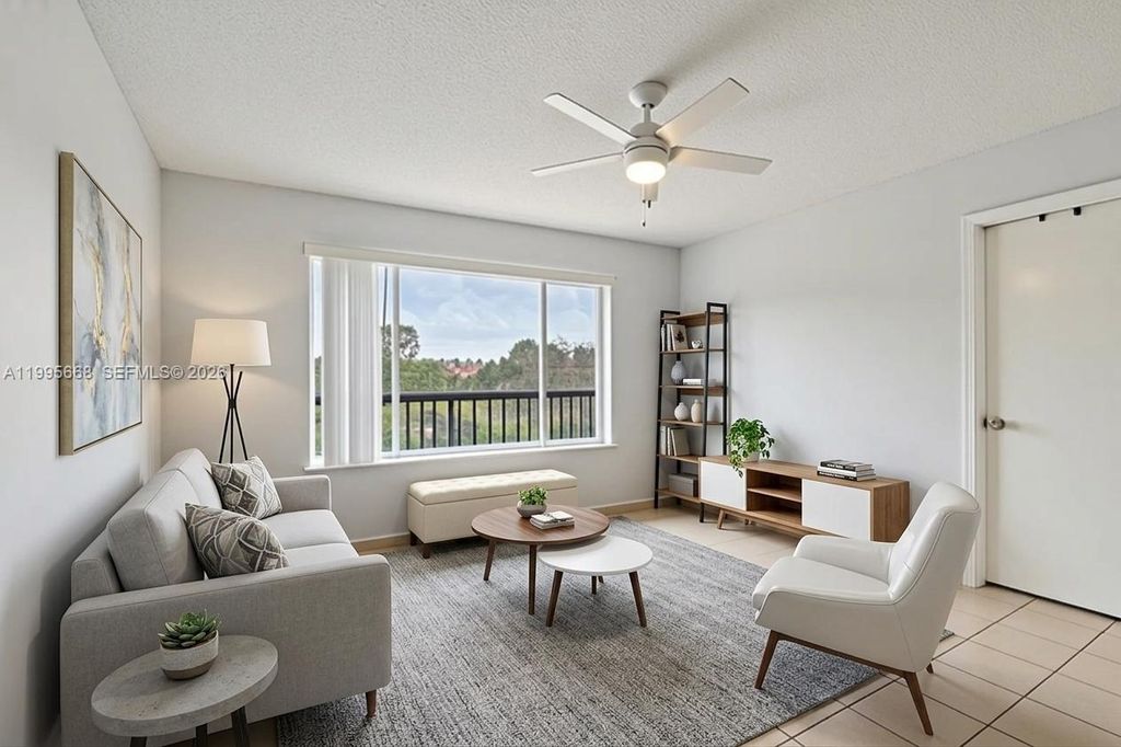 Photo of 9930 Twin Lakes Dr #7-L, Coral Springs, FL 33071 (MLS # A11995668)