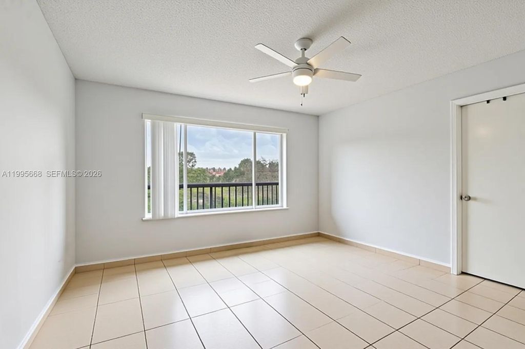 Photo of 9930 Twin Lakes Dr #7-L, Coral Springs, FL 33071 (MLS # A11995668)