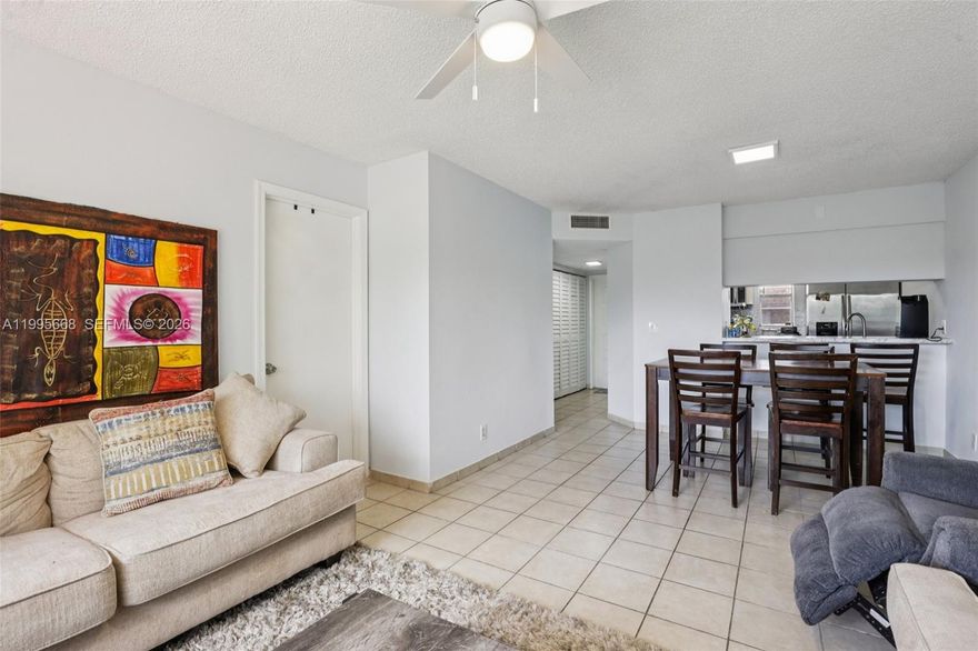 INVESTOR'S DREAM — TENANT IN PLACE THROUGH JANUARY 31, 2027. Rare opportunity to acquire a fully occupied, cash-flowing condo in the heart of Coral Springs generating a cap rate of approximately 4.5%. Current tenant pays $1,900/month with a lease secured through January 31, 2027 — buyer starts collecting rent from day one with zero vacancy risk.

This bright 2-bedroom / 2-bathroom top-floor  apartment is nestled in the sought-after Lakewood Village community. The split-bedroom layout offers privacy. Fully equipped kitchen with dishwasher, microwave, electric range, and refrigerator. In-unit washer and dryer, closets , tile floors throughout, and one assigned parking space. The kind of unit tenants love and rarely leave.

HOA fee covers water, sewer, trash, pest control (interior), landscaping, and common area maintenance — making expenses predictable and manageable. Community amenities include a pool, kiddie pool, spa/hot tub, and clubhouse.

Unbeatable location — minutes from Coral Square Mall, top-rated restaurants, major highways, and A-rated schools (Maplewood Elementary, Ramblewood Middle). High rental demand area with strong long-term fundamentals. A true plug-and-play investment in South Florida's resilient market.

Conventional Loan requires 25% downpayment.