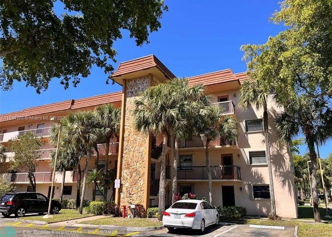 Spacious unit in desirable Lakes of Carriage Hills. Large 1270+ sq ft apt. Balcony overlooking the lake. Walk-in closet, large laundry room, eat in kitchen. new elevator, roof and 40 yr certification completed. Community: Heated pools, Jacuzzi, sauna. pool tables, exercise room, library, party room, card room, all amenities included in maintenance also cable and Internet. light & phone your bill. Credit 600, $40 k yearly income, 20% down, area for small truck. Will help with association approval. Close to Airport and the beach, shopping, malls and downtown ft lauderdale AC & water heater 5 yrs old. Refrigerator new