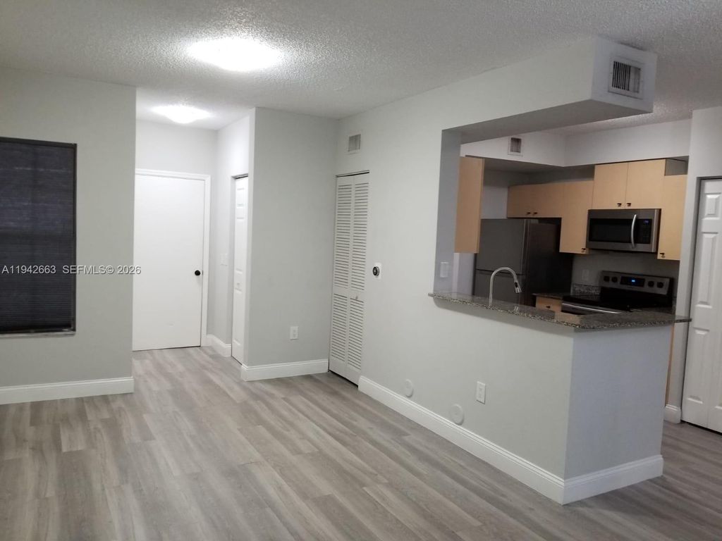 Photo of 2470 Centergate Dr #102, Miramar, FL 33025 (MLS # A11942663)