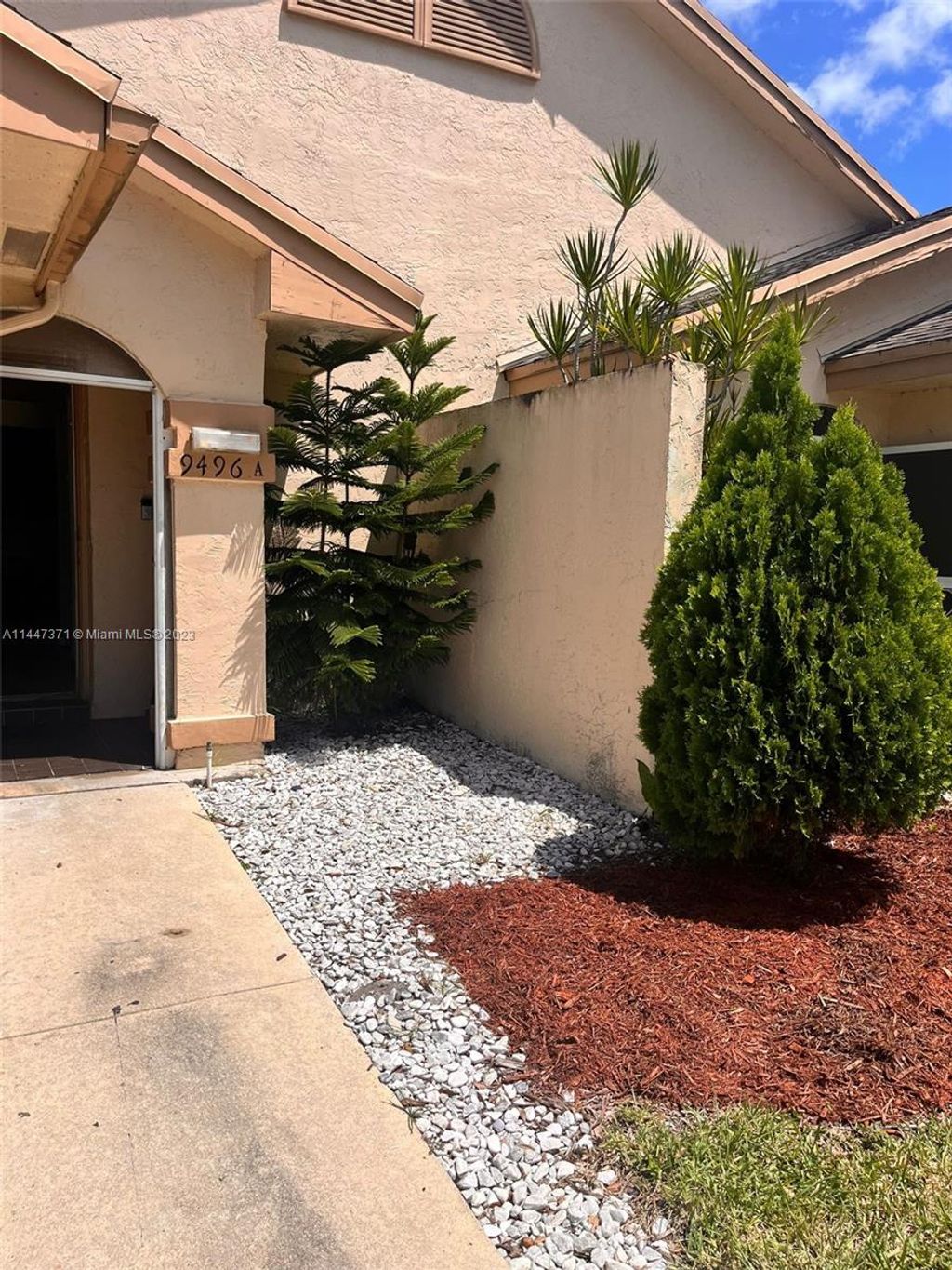 Photo of 9496 Boca Gardens Pkwy #A, Boca Raton, FL 33496 (MLS # A11447371)