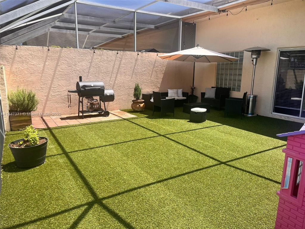 Photo of 9496 Boca Gardens Pkwy #A, Boca Raton, FL 33496 (MLS # A11447371)