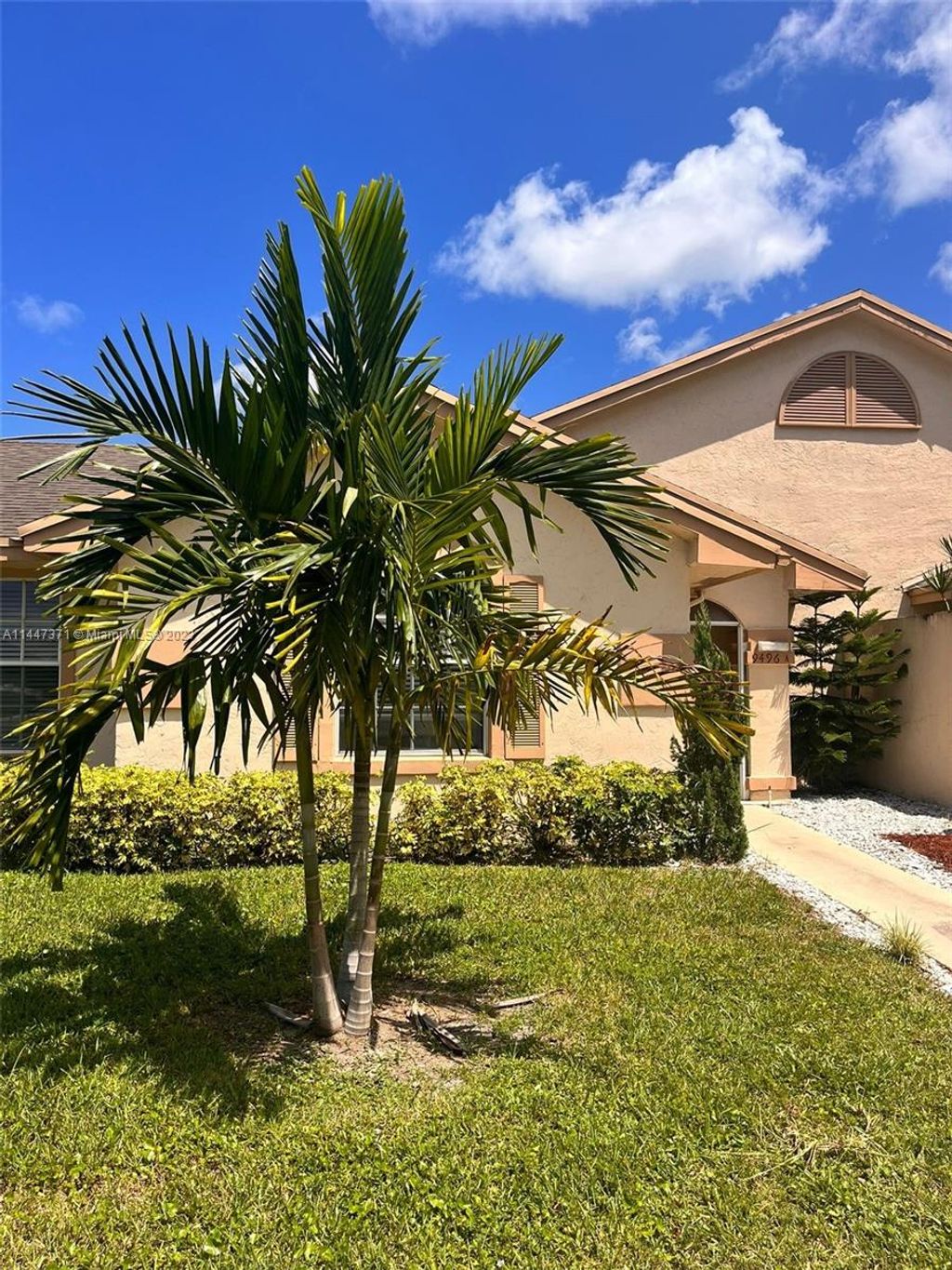 Photo of 9496 Boca Gardens Pkwy #A, Boca Raton, FL 33496 (MLS # A11447371)