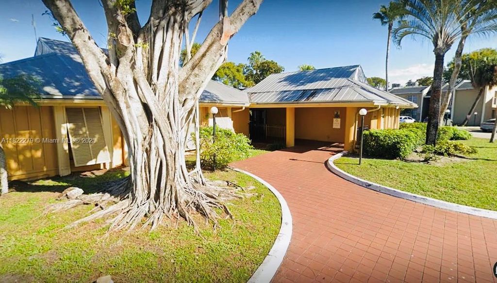 Photo of 4467 Treehouse Ln #G, Tamarac, FL 33319 (MLS # A11822279)