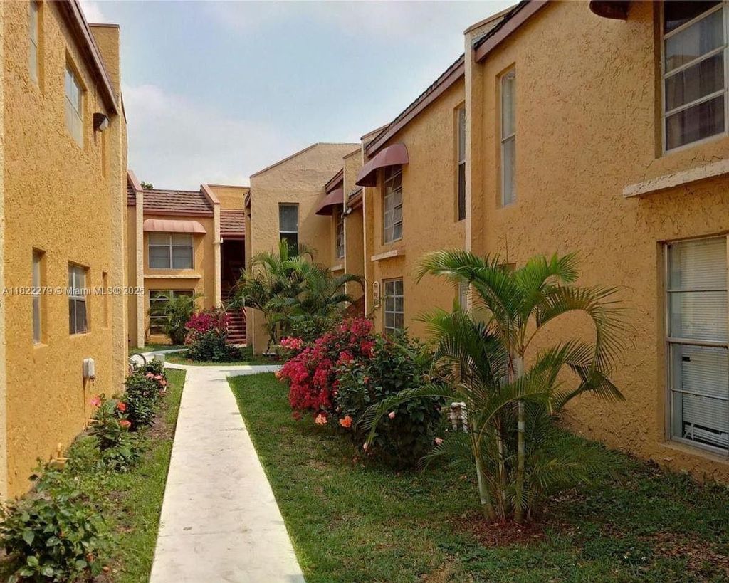 Photo of 4467 Treehouse Ln #G, Tamarac, FL 33319 (MLS # A11822279)