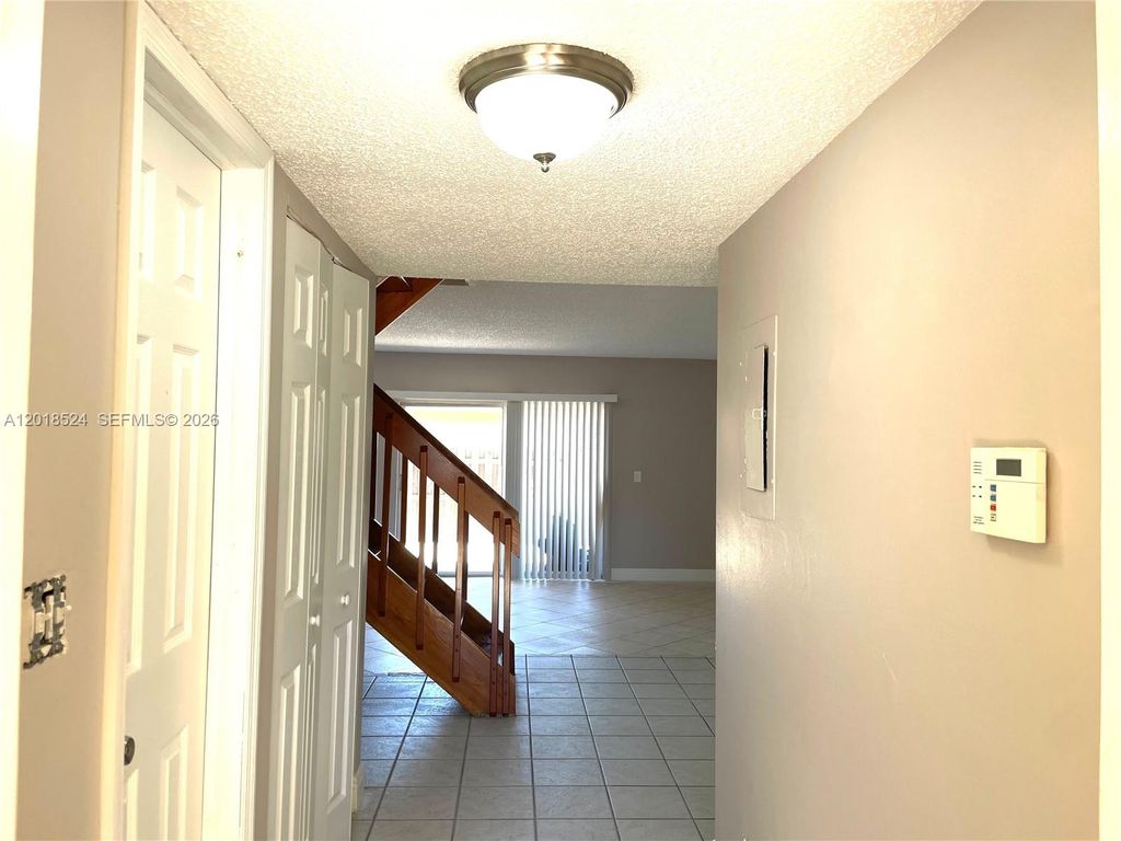 Photo of 7175 Nova Dr #107, Davie, FL 33317 (MLS # A12018524)