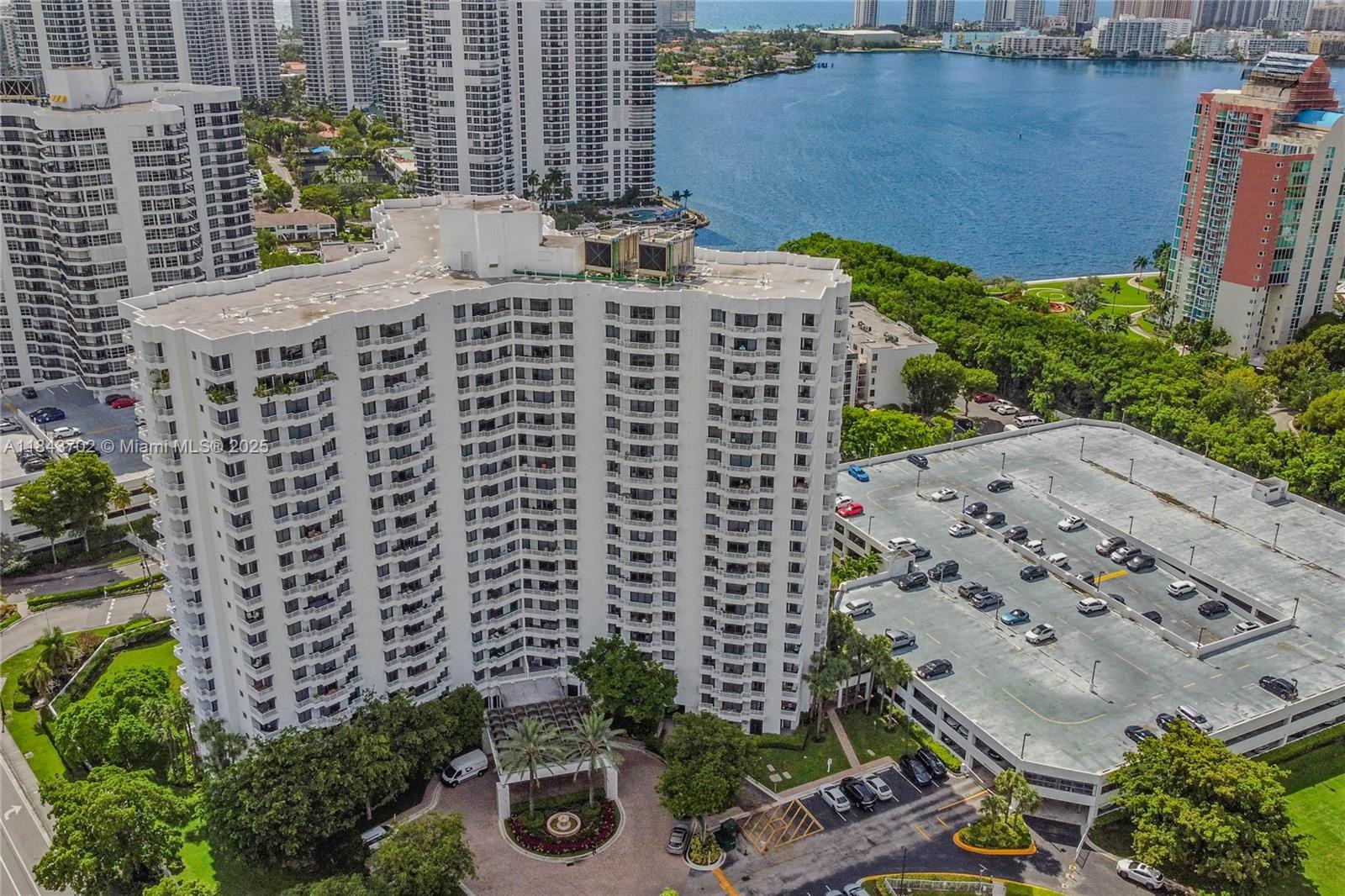 Perched on the 19th floor, this 2-bedroom, 2-bath condo offers stunning views of the Intracoastal, Atlantic Ocean, and pool area. Spanning 1,181 sq. ft., the open layout is bathed in natural light, with large windows showcasing the beautiful scenery. The kitchen features modern appliances, including a dishwasher and microwave, while the full-size washer and dryer add convenience. Both bedrooms are spacious, with walk-in closets for extra storage. Located in a secure building with amenities like a pool and spa, this condo provides the perfect balance of comfort and style for modern living.