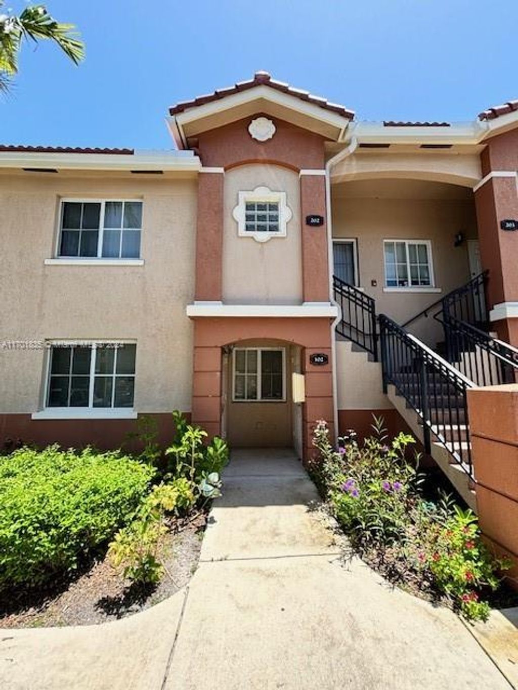 Photo of 3504 Briar Bay Blvd #102, West Palm Beach, FL 33411 (MLS # A11701835)