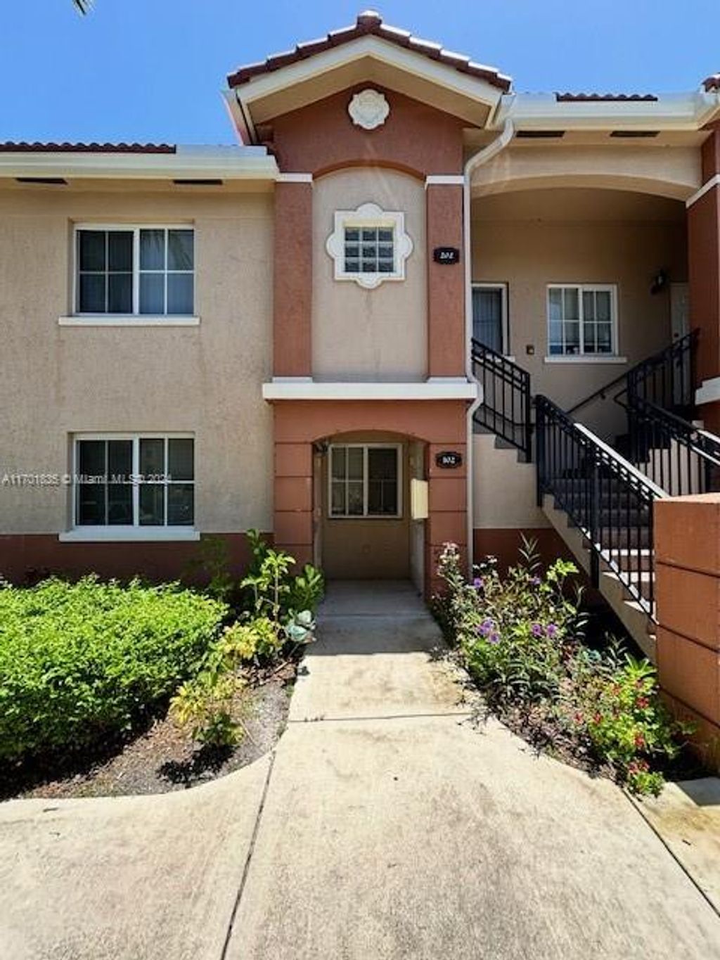 Photo of 3504 Briar Bay Blvd #102, West Palm Beach, FL 33411 (MLS # A11701835)