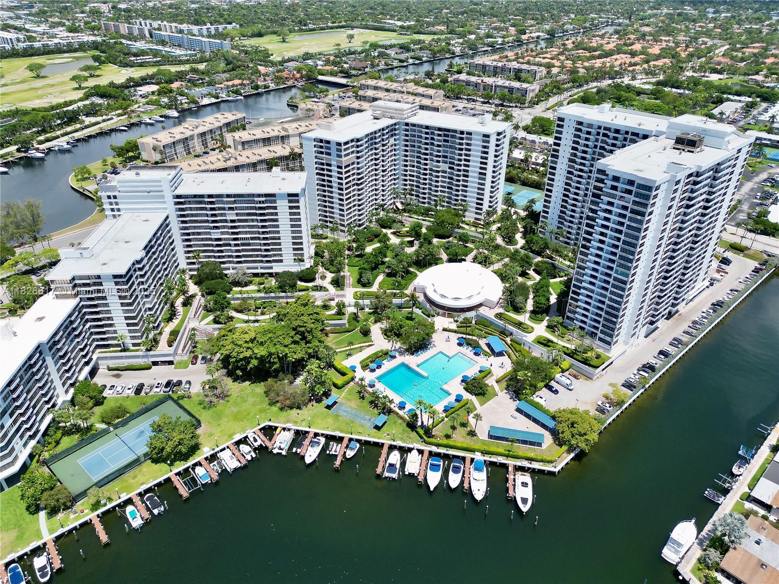 Now is the time to buy a beautifully updated waterfront condo in rapidly evolving Hallandale Beach! This spacious 1 bedroom and 1.5 bathroom home is updated throughout with porcelain floors, smooth ceilings with led lighting, quartz counters, modern cabinetry, Elfa closets, and Duravit, Hansgrohe, and Kohler fixtures. Property amenities include the recently updated large gym, pool deck overlooking the marina and bay, tennis courts, a bbq area, card rooms, mens and women's saunas and locker rooms with showers, party room, card room, walking paths, and more. This development is surrounded by restaurants, stores, Shell Bay by Auberge, Mondrian Hallandale, and the Beach!