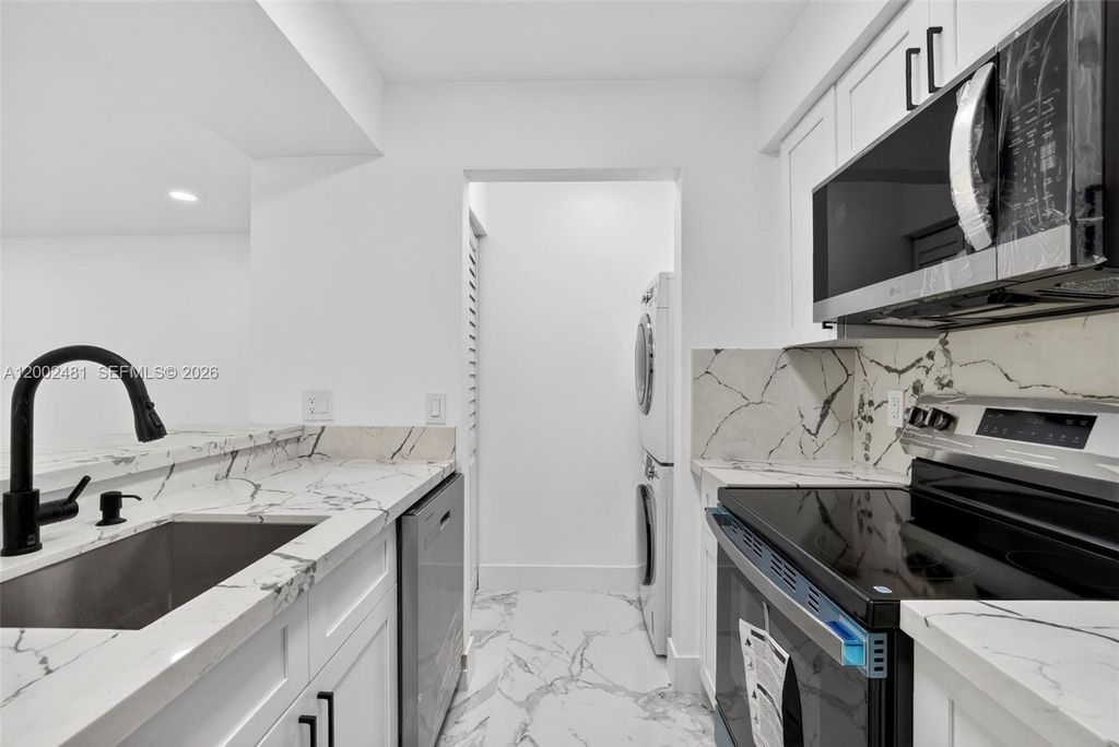 Photo of 1227 SW 46th Ave #314, Pompano Beach, FL 33069 (MLS # A12002481)