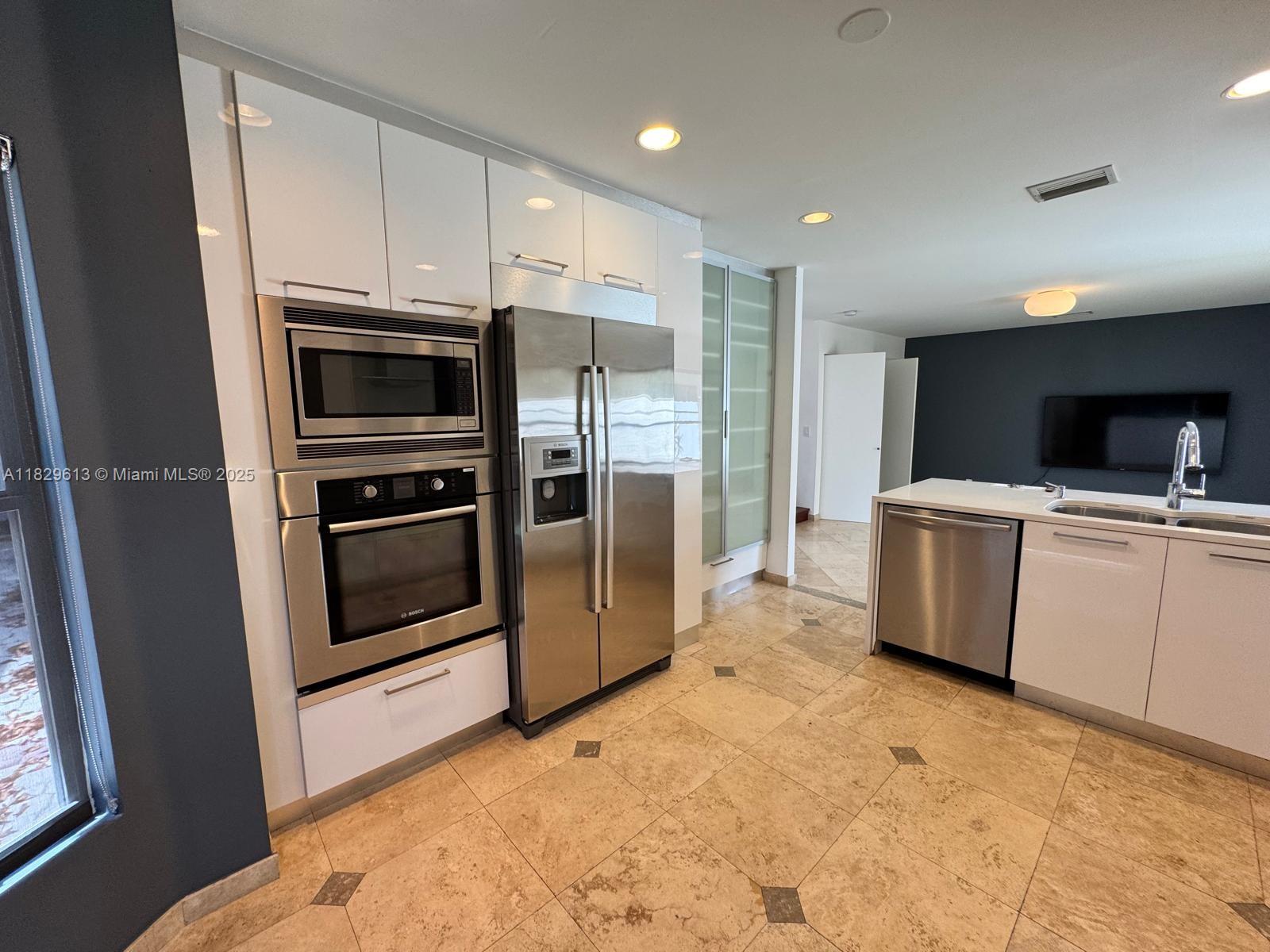 Located in a desirable gated community, this stunning property offers unbeatable convenience near the Hard Rock Café, with several synagogues just a short distance away. Ideally situated between I-95 and the Florida Turnpike, this home combines comfort, security, and accessibility in one perfect package.