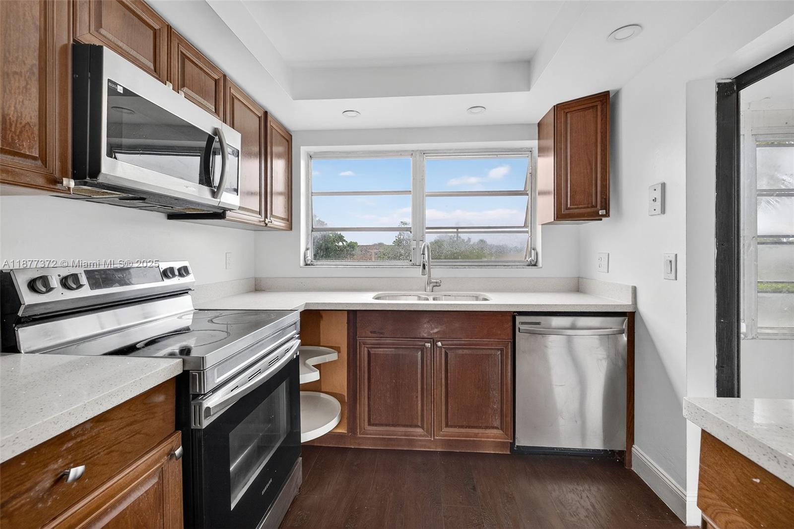 Beautifully updated 2BR/2BA with large Florida room and excellent storage! This cash-only 3rd floor unit in an elevator building features new paint, renovated kitchen, vinyl floors, updated bath fixtures, and 2023 appliances. A/C 2008. All-ages, pet-friendly community with secure entrance, pool, clubhouse, and washer/dryer on each floor. Association requires 675+ credit, $45K+ income, and does not allow rentals. Cash only.