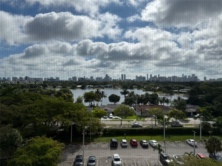 Beautiful 8th floor condo in the heart of North Miami with open layout and natural light .Spacious unit Featuring well -maintained interiors, generous bedroom size, and private balcony with open views.  The kitchen has its all stainless steel appliances. The master bedroom has access to a screened balcony to enjoy the sunrise, and beautiful views around the community lake which will make your mornings more relaxing. Located close to the guest parking, within a guard-gated community for added security. HOA TV Cable HD2 700 channels/internet high speed 500x500. Wonderful up-kept community, close to nice restaurants and supermarkets. The building just passed the 40-years inspection as per condo association. This is a gated community with 24-hour security, beautiful landscaping, and incredible views. Near I95, Turnpike, Biscayne, Beaches and Aventura Mall. This condominium has reserves, so can be financed. Priced to sell-schedule your showing today!
