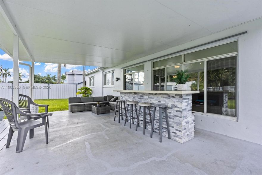 **REDUCED**   This charming property nestled in the NW neighborhood. The open floor plan creates a bright and inviting space, perfect for gatherings and everyday living. The updated kitchen flows seamlessly into the main living areas and features a custom-built bar ideal for hosting celebrations and spending quality time together. A versatile extra room offers the perfect space for a home office, study area, or homeschool room to fit today’s lifestyle needs. New A/C installed in December 2025, hot water heater in 2025. Metal roof 2007. Conveniently located near schools, shopping, parks, and everyday essentials, this home offers comfort, flexibility, and convenience for the whole family.
