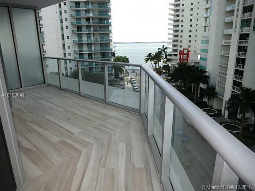 Spectacular 1BR/1BA with tile floors in BrickellHouse. Top of the line kitchen and bathroom. Balcony from both living room and bedroom with bay views. Rooftop pool. Owner requires first, last & security. Tenant must also pay one month common area deposit to association. No pets. One year leases only. Only offers accompanied by an escrow letter will be considered. Robotic parking system is closed until further notice. Alternate arrangements provided by association.