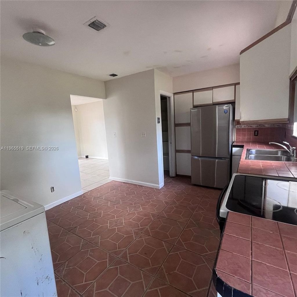 Photo of 114 SW 67th Ter, Pembroke Pines, FL 33023 (MLS # A11965519)