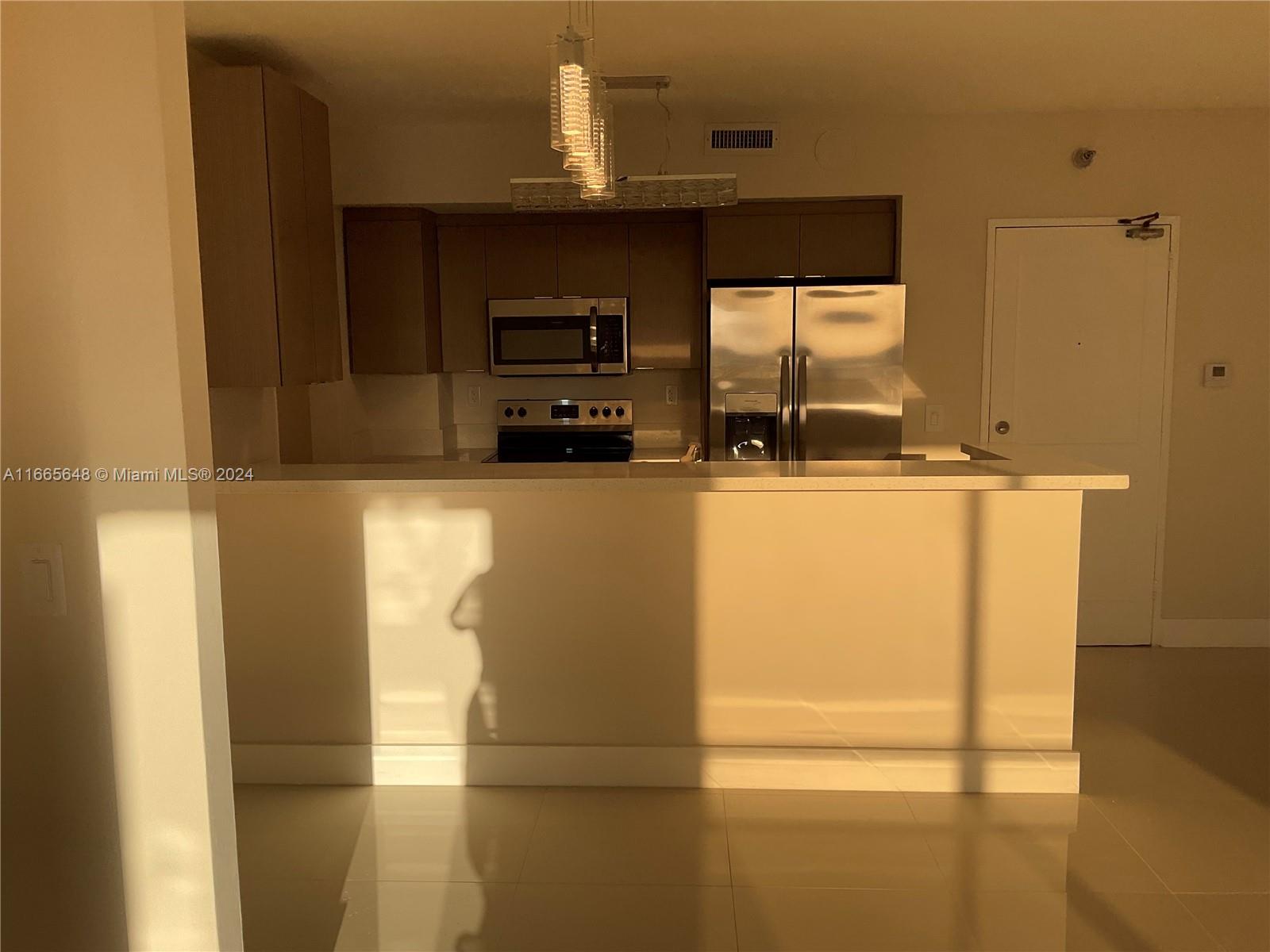 10185 Collins Ave 406