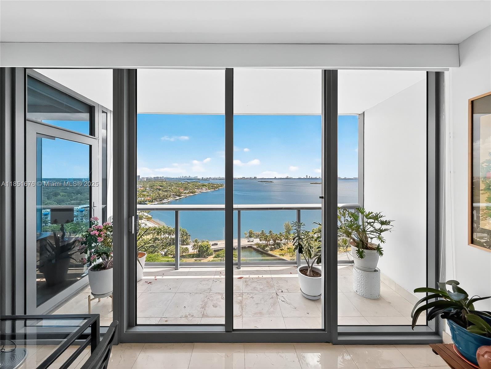 Wake up to breathtaking sunrises over the Biscayne Bay! This coveted 11-line residence at the iconic Blue Condo offers 1BD/1.5BA with unobstructed water views of the Biscayne Bay through dramatic floor-to-ceiling windows, luxurious marble floors, upgraded master bathroom, custom walk-in closet with built-in cabinetry, and wine refrigerator for effortless entertaining. World-class resort amenities include dual pools, state-of-the-art fitness center, sauna and steam room, private movie theater, media lounge, business center, BBQ areas. Includes two parking spaces (1 assigned + 1 owner's valet), semi-private elevator and storage unit. Prime Edgewater location minutes from Midtown shopping, Design District, Wynwood, Miami Beach, Brickell and airport with easy I-95 access. Pure Miami luxury!