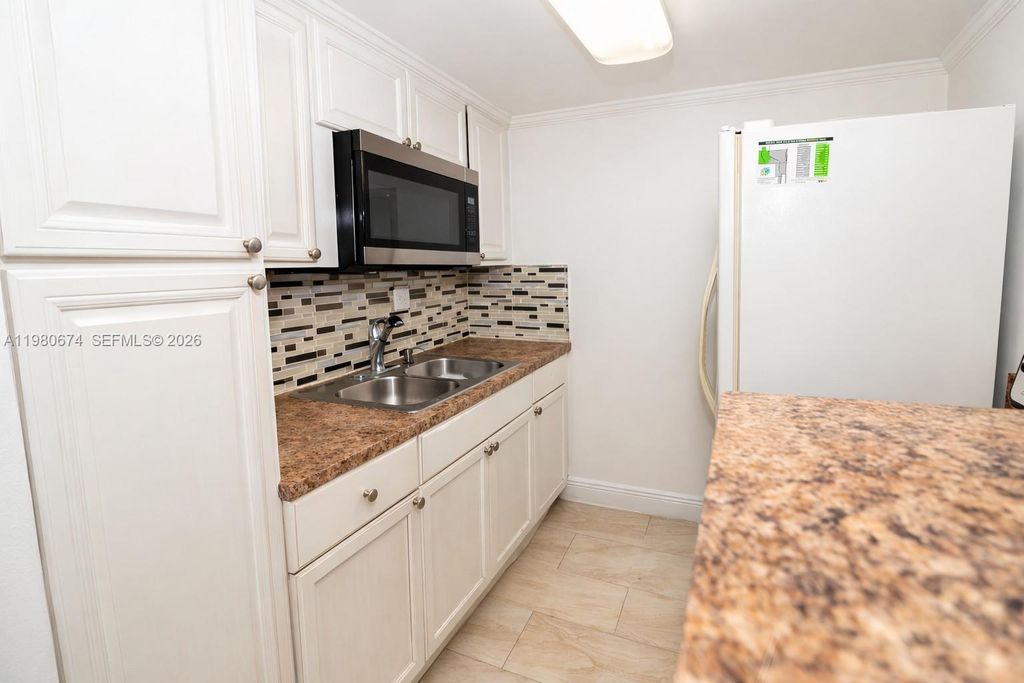 Photo of 2203 NW 55th Ter, Lauderhill, FL 33313 (MLS # A11980674)