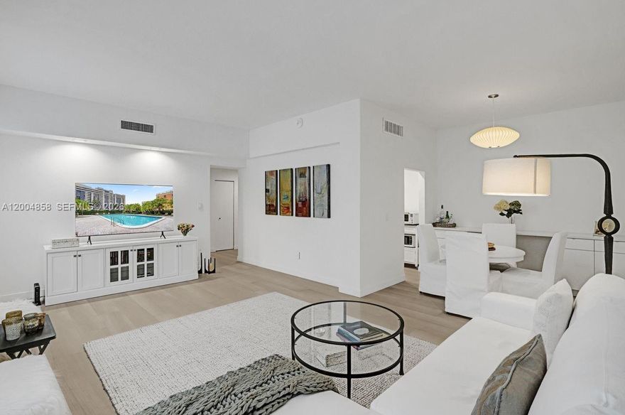 Beautifully upgraded 2-bedroom, 2-bath residence featuring a spacious layout and offered fully furnished for true turnkey living. This modern home showcases high-end finishes, 10-foot ceilings, hurricane-impact windows, and motorized shades in the living areas. Lots of closet space which include 3 walk ins & 2 for linens/storage.  

Enjoy the ease of first-floor living with amenities just steps away, including the pool, jacuzzi, and sauna—no elevator needed for daily convenience.

Additional highlights include covered parking and a private exterior storage unit. Ideally located directly across from Granada Golf Course and just a short walk to Miracle Mile, offering premier dining, cafés, shopping, and everyday conveniences.

Gables Plaza is a well-managed, boutique building in the heart of Coral Gables. All required certifications are in place with no special assessments. SIRS and Milestone reports have been completed and are available, providing added confidence for buyers. Enjoy two-zone A/C powered by the association, which includes cooling and water heating—helping keep monthly electric expenses remarkably low.

3D Matterprot tour available for immediate virtual viewing, please inquire.