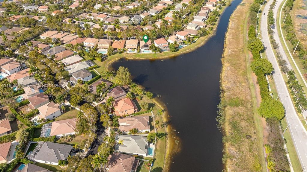 Photo of 766 Sunflower Cir, Weston, FL 33327 (MLS # A11959256)