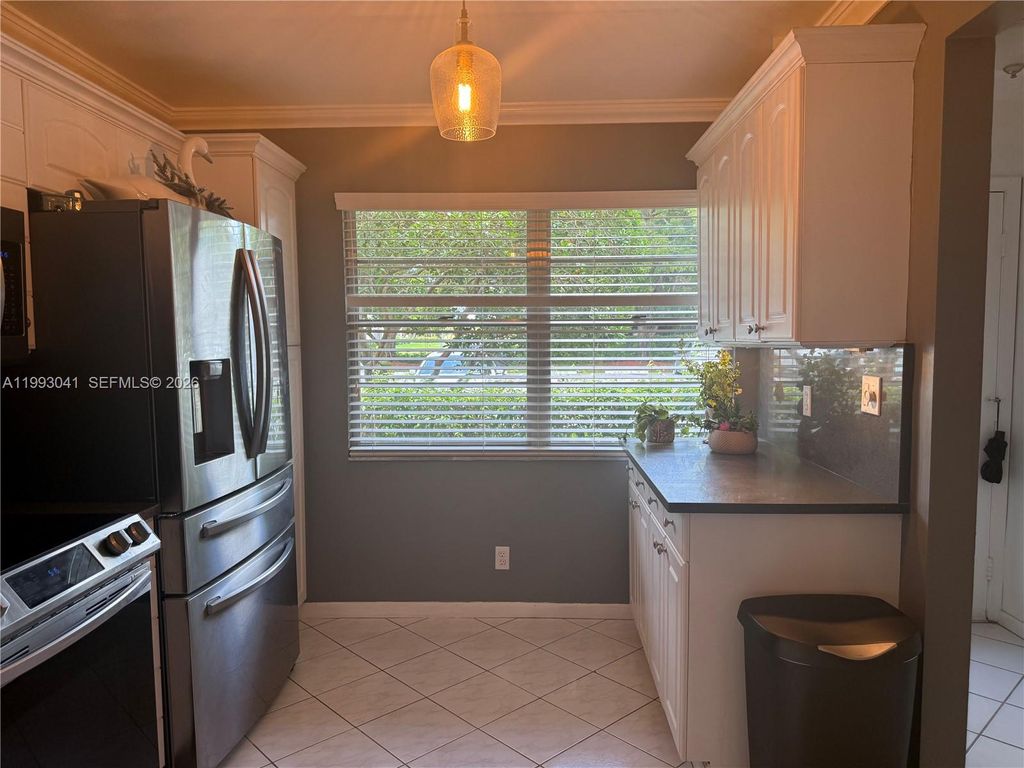 Photo of 2403 Antigua Cir #K1, Coconut Creek, FL 33066 (MLS # A11993041)