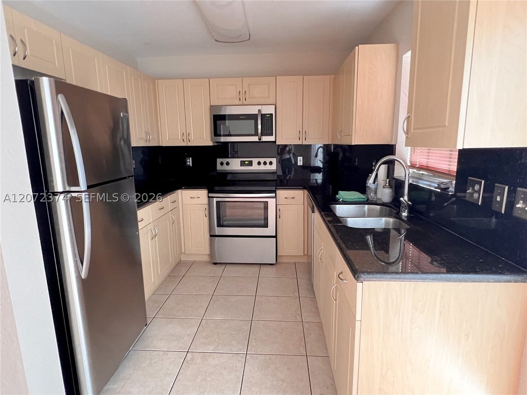 Photo of 2301 SW 86th Way #2301, Miramar, FL 33025 (MLS # A12072374)