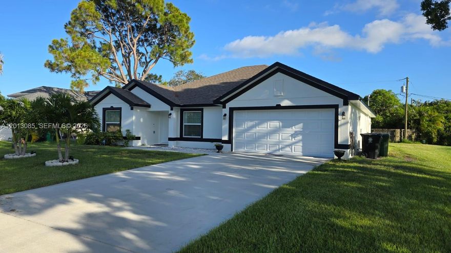 Charming single-family home with no HOA. The kitchen boasts 36" wood cabinetry with 6-inch pulls and stainless-steel appliances. Additional highlights include brushed nickel Moen faucets, 5 1/4" baseboards, energy-efficient dual-pane Low E windows, and brushed nickel lever door handles. Ceiling fans are featured in both the master bedroom and family room. Conveniently located east of US 1, just minutes from Jensen Beach, shopping and dining.